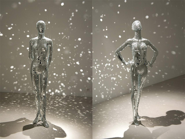 “Artist Lilibeth Cuenca Rasmussen created a series of four reflective mannequins clad in shards of mirrors.”