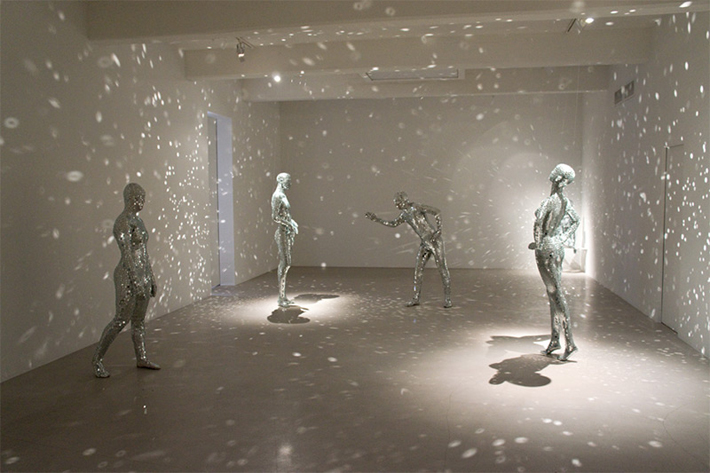 “Artist Lilibeth Cuenca Rasmussen created a series of four reflective mannequins clad in shards of mirrors.”