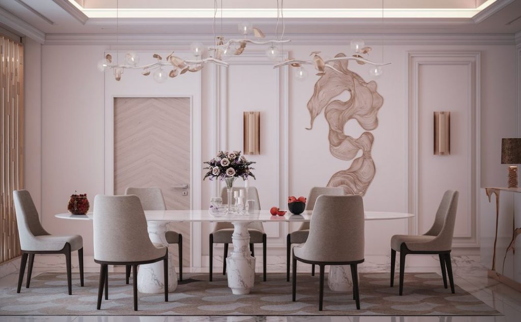 sala de jantar de luxo com mesa de jantar em mármore, aparador branco e gbold e cadeiras creme