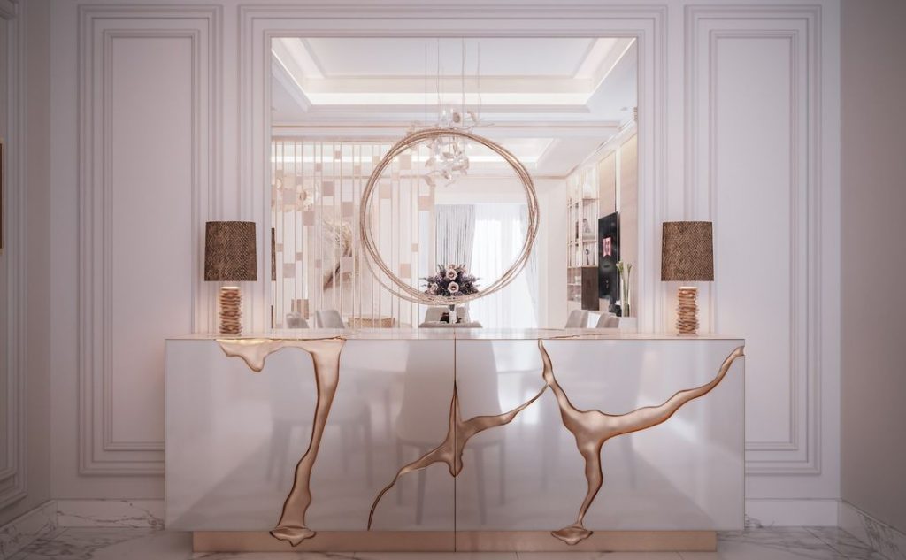 luxury dining room with a white and gold sideboard