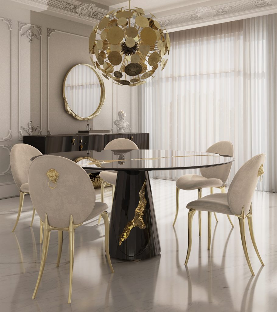 Dining setting featuring the Lapiaz Round Dining Table by Boca do Lobo, highlighting the contrast between the stone-like crack and the smooth exterior.