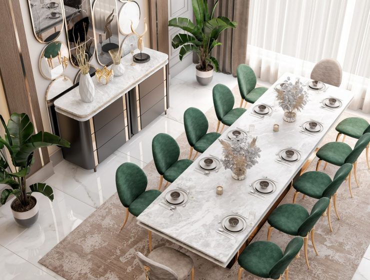 luxury dining room with a marble dining table and green dining chairs