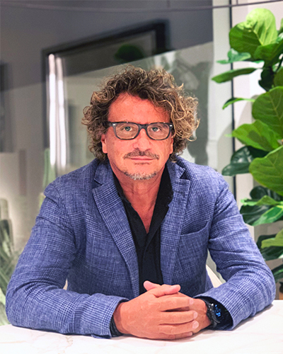 Portrait of Spanish designer Guillermo Blanco standing in his Dubai studio, showcasing his bold and distinctive design philosophy.