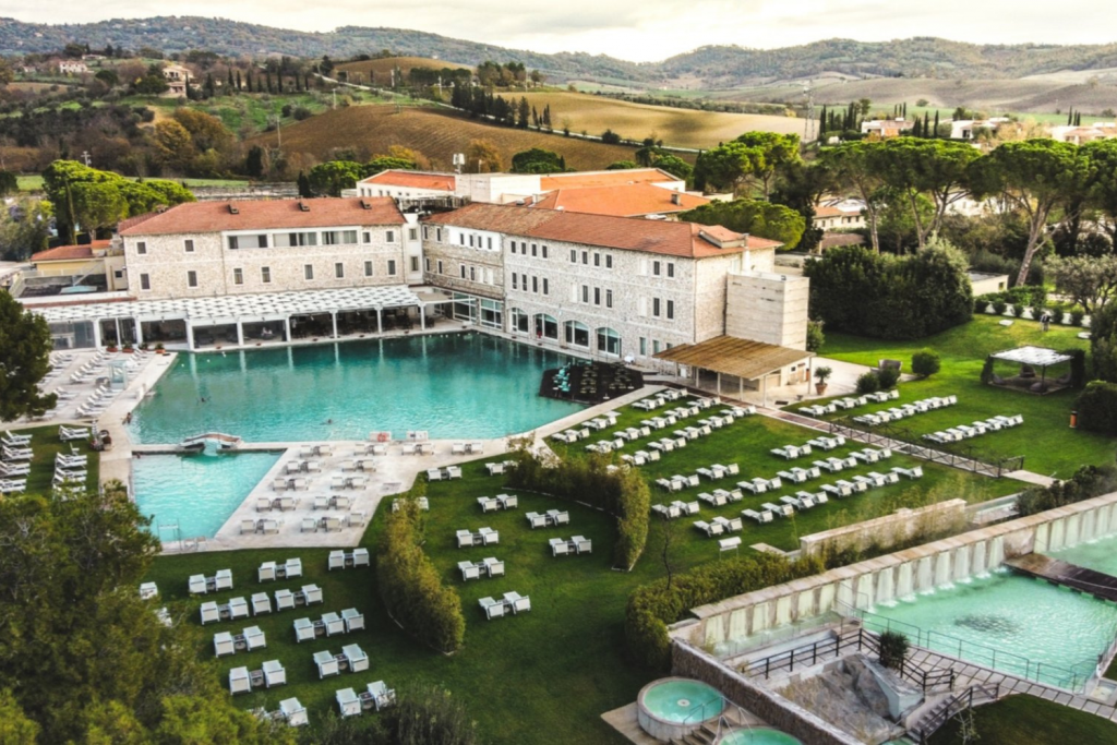 Luxury Thermal Baths in Europe, Large outdoor thermal swimming pool at a classic Italian resort in the Tuscany countryside.