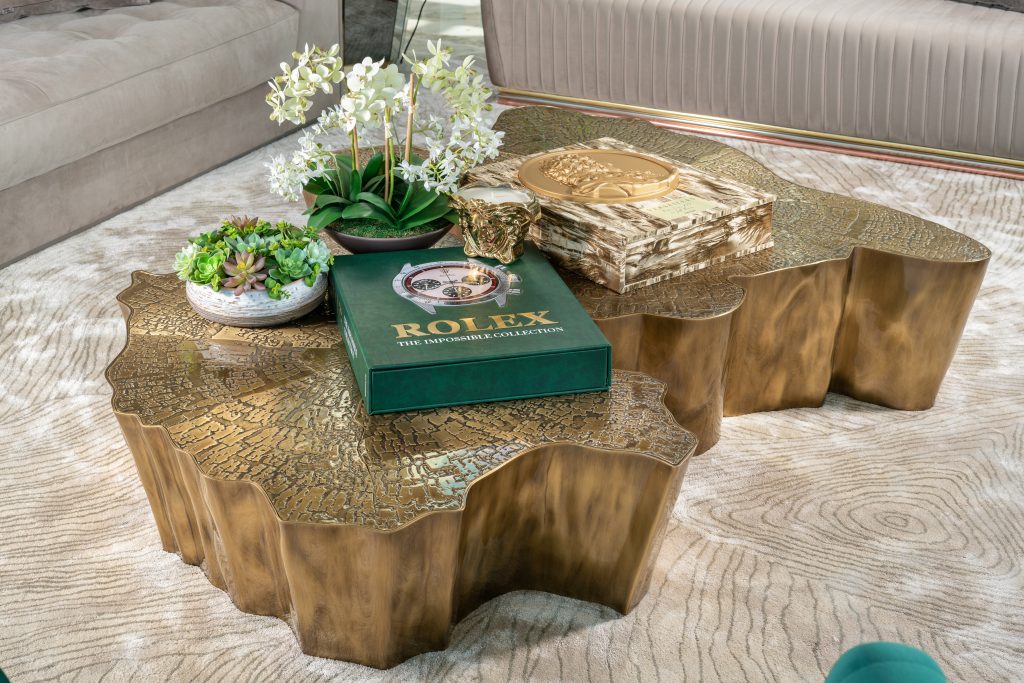 Luxury Residence in Sri Lanka, close-up of Eden center table with textured gold surface and curated decorative objects