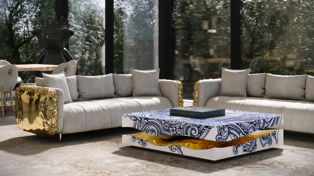 Modern living room featuring two grey sofas with gold metallic armrests and a square coffee table decorated with blue and white traditional tile patterns and a gold interior., Quarry Tiles Center Table
