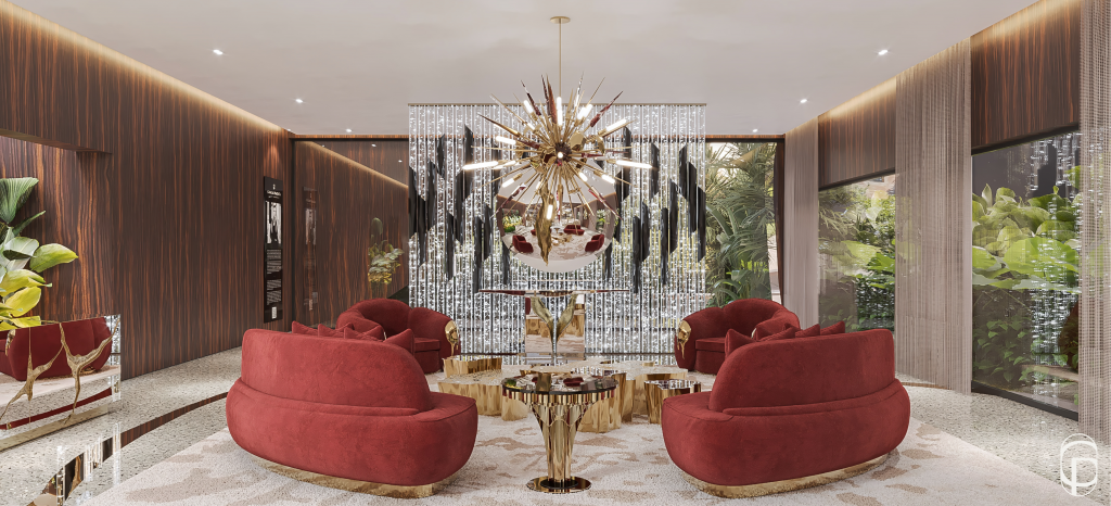 Luxury lounge area with red velvet curved sofas and armchairs, a gold starburst chandelier, mirrored crystal wall panel, and marble terrazzo flooring. showroom de luxo em sao paulo