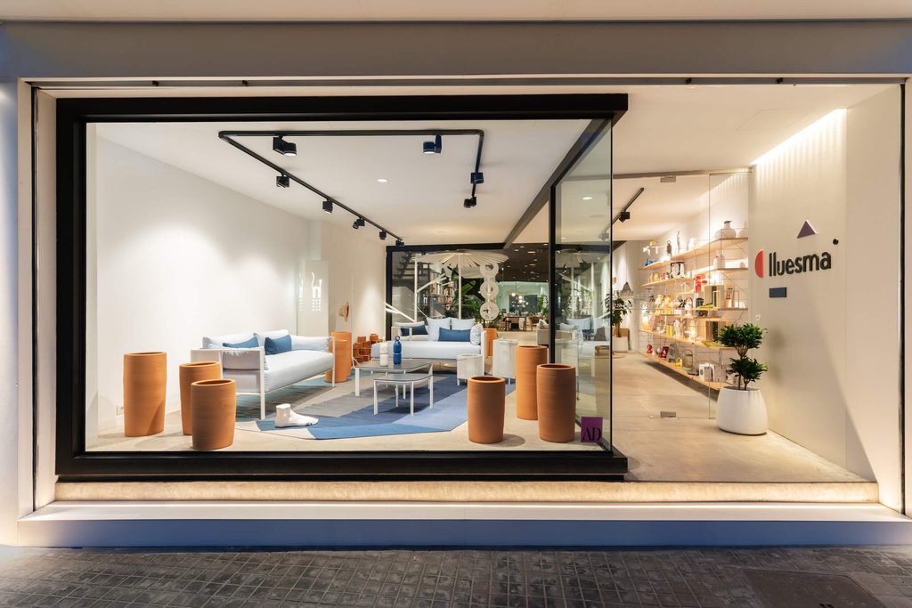 Modern furniture store window with sofas and clay decor, luxury showrooms in Palma de Mallorca