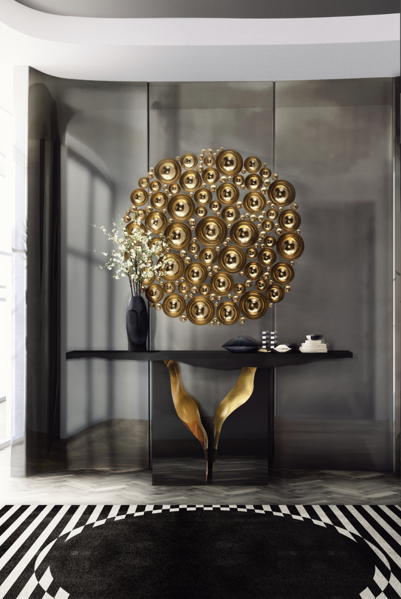 black and gold lapiaz console in a dark entryway luxury furniture by boca do lobo