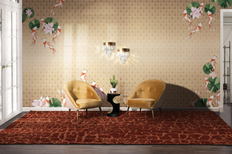 An open entryway with a floral wallpaper and a reading area with two modern armchairs by BRABBU