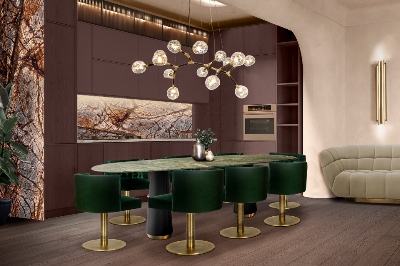 modern open space with a modern dining table and green velvet dining chairs