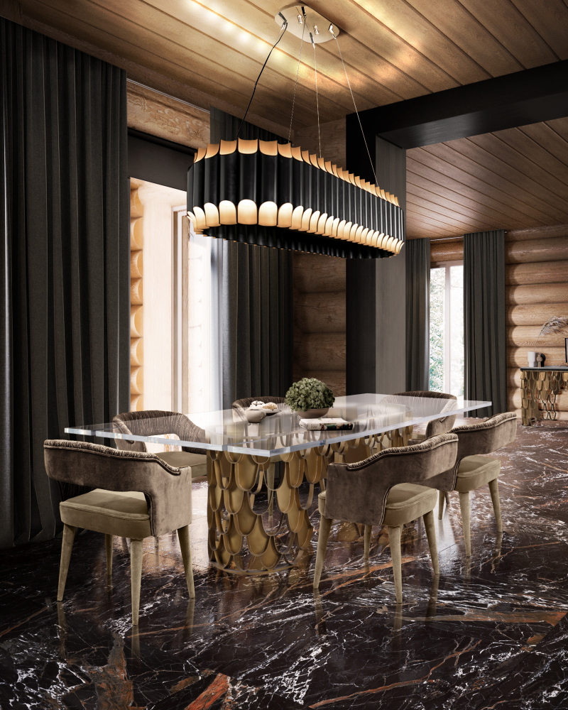 luxury dining room featuing a moder dining table with a glass top and velvet dining chairs