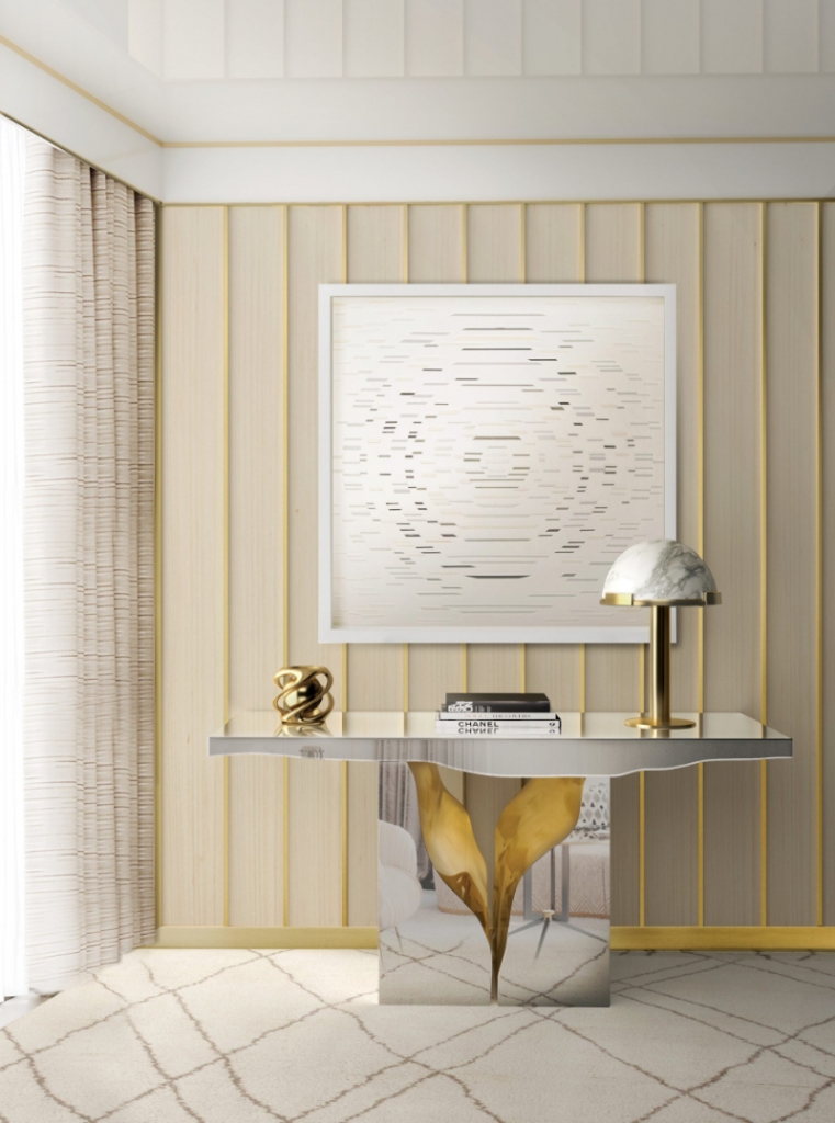 luxury entryway with a white console and gold details