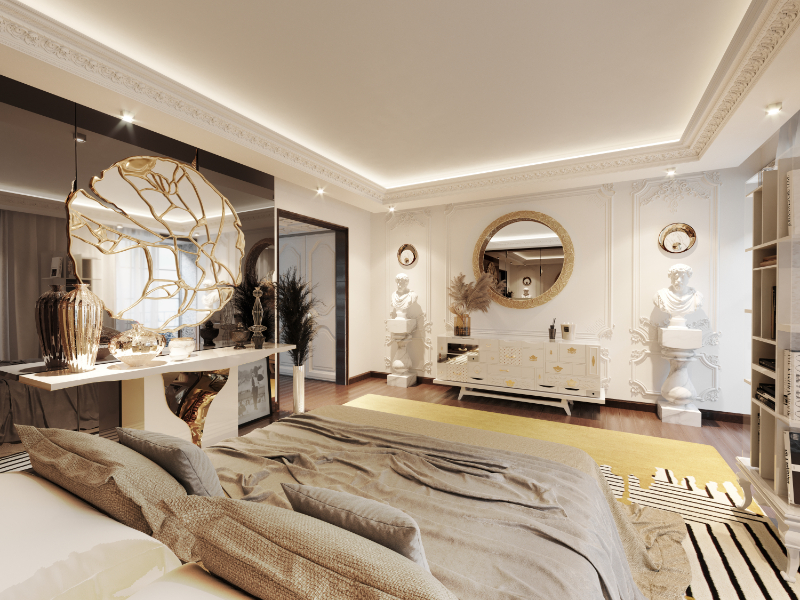 luxury bedrooms - bed with beige blankets and cushions, white console with gold details, gold mirrors, white sideboard, plants