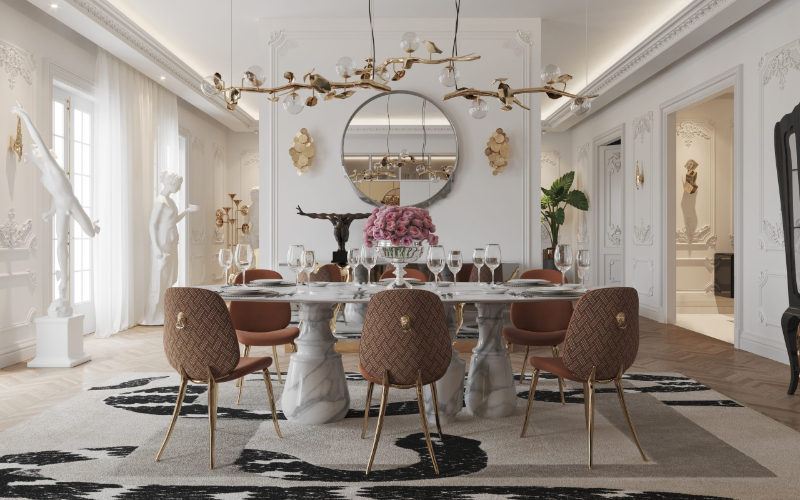 neutral tones in a modern dining room with a gold suspension lamp, a marble dining table and orange chair