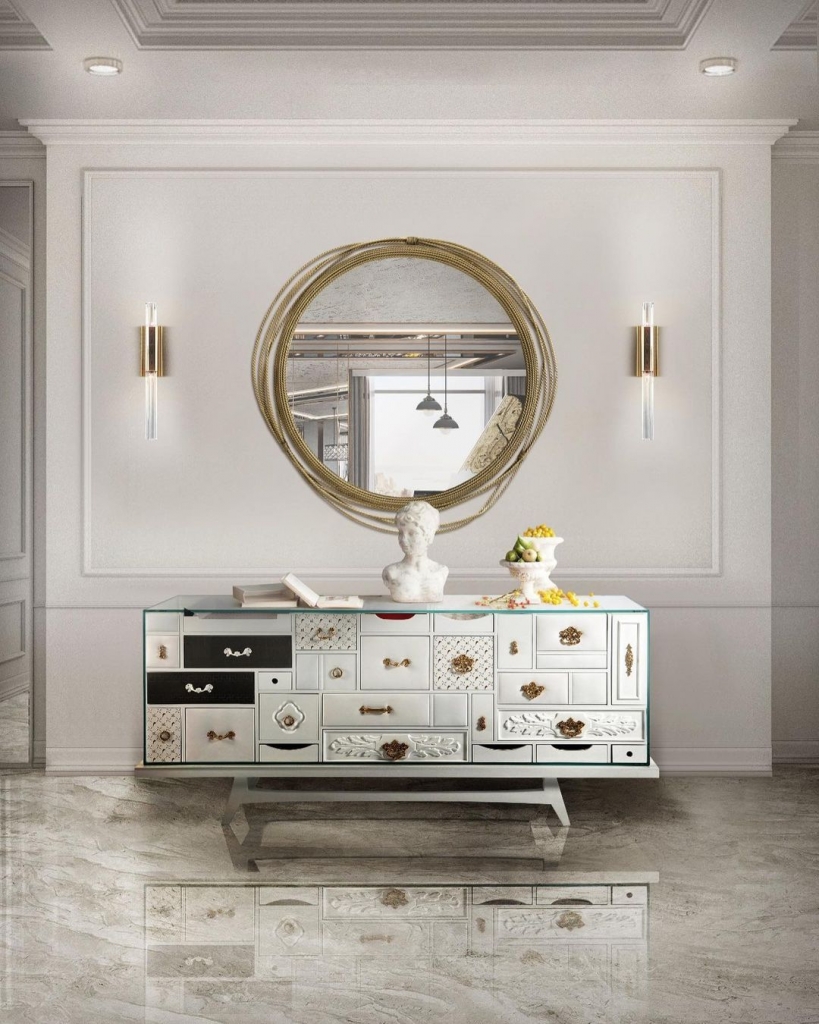 contemporary white sideboard with a gold mirror