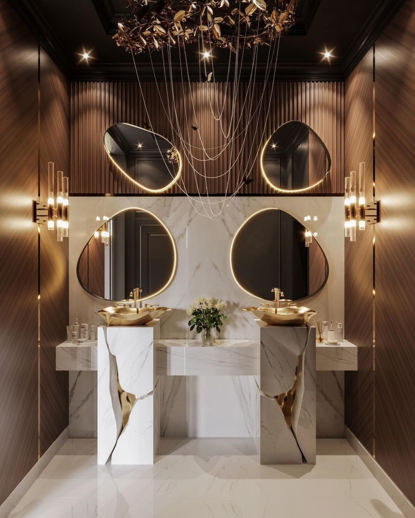 warm bathroom design with a white and gold freestanding