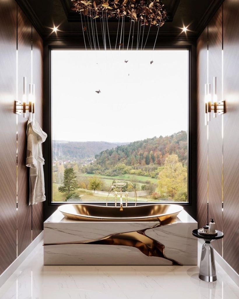 warm bathroom design with a white and gold bathtub