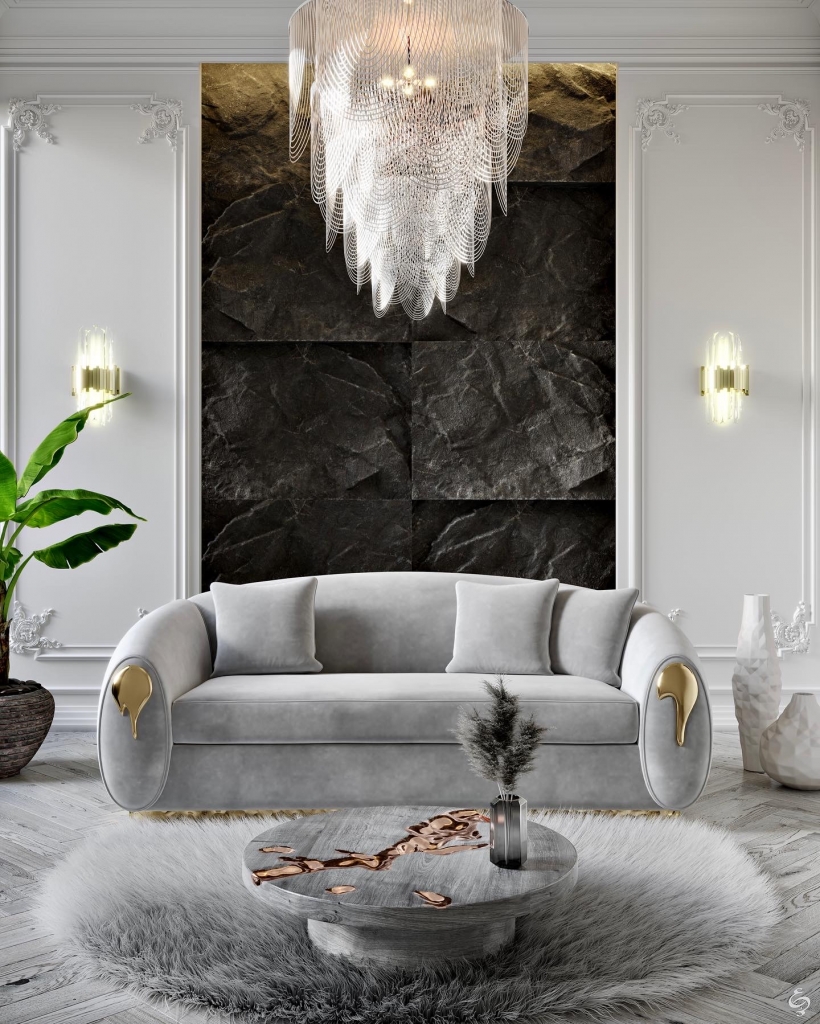 grey tones in a modern living room design with a curved sofa and a grey round marble center table