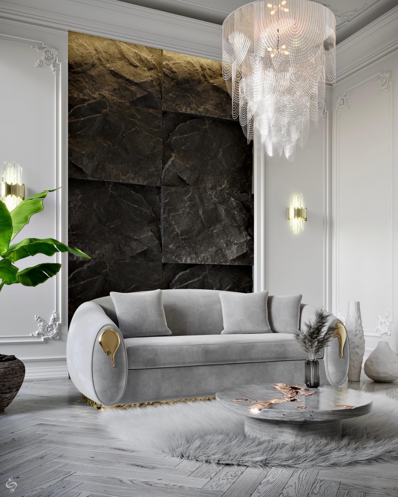 grey tones in a modern living room design with a curved sofa and a grey round marble center table