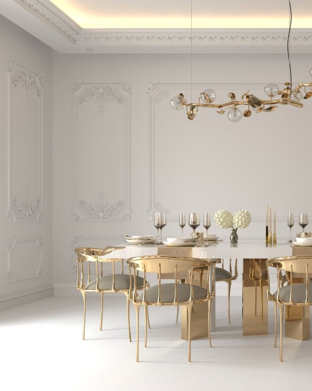 luxury living area with a golden chair with nude seat, white and golden dining table and a golden suspension lamp for your living room