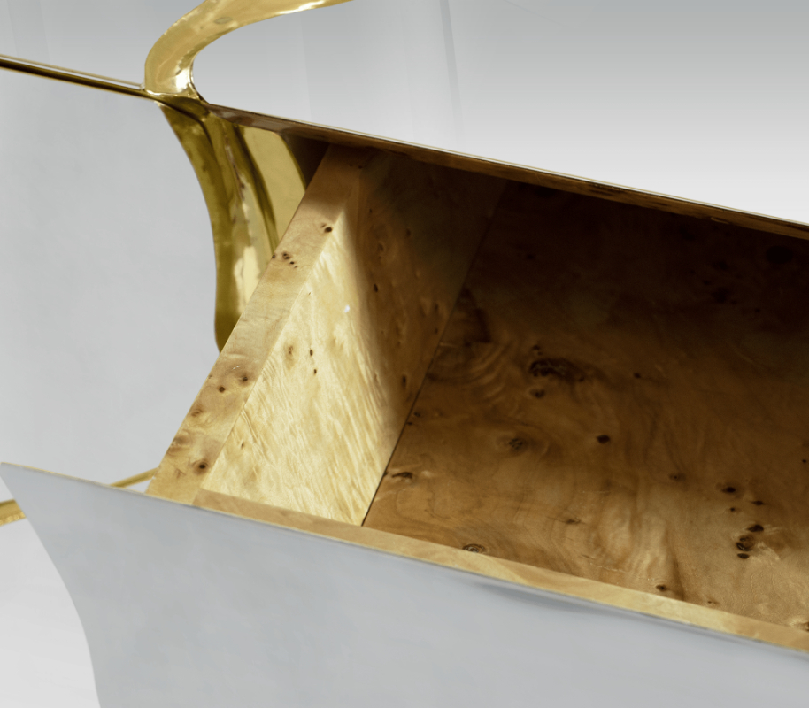 luxury white and golden details of the sideboard for your living room