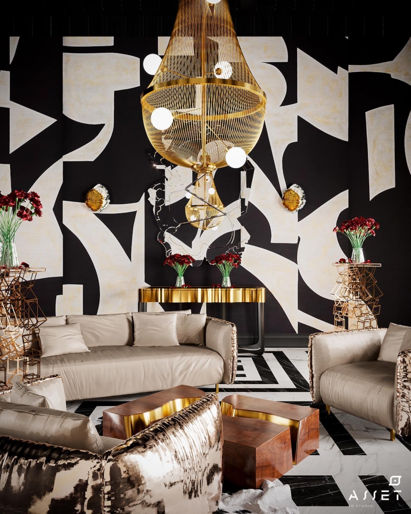 black and white living room design with a gold console, walnut center table and cream armchairs
