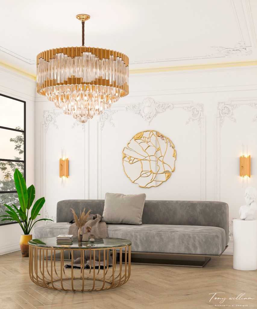 modern living room with a grey sofa, a gold chandelir and mirror