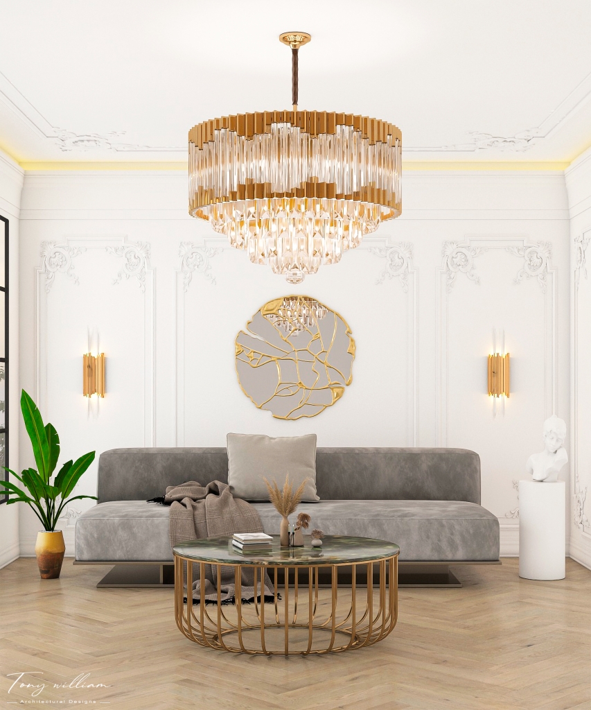 modern living room with a grey sofa, a gold chandelir and mirror