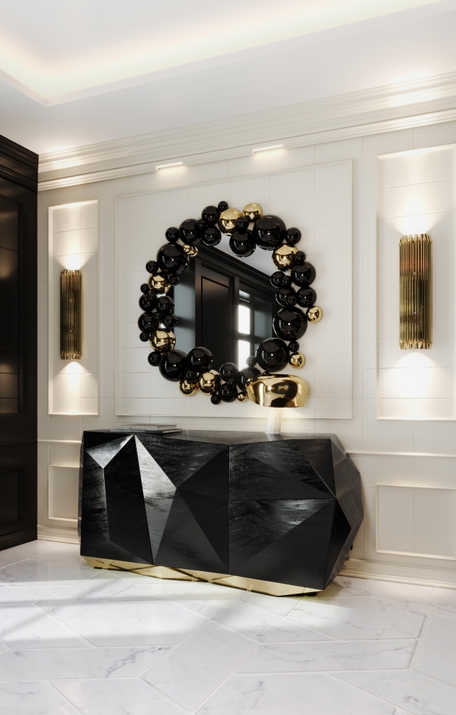 Contemporary black luxury sideboard with a dramatic faceted design, handcrafted by Boca do Lobo for high-end modern interiors.