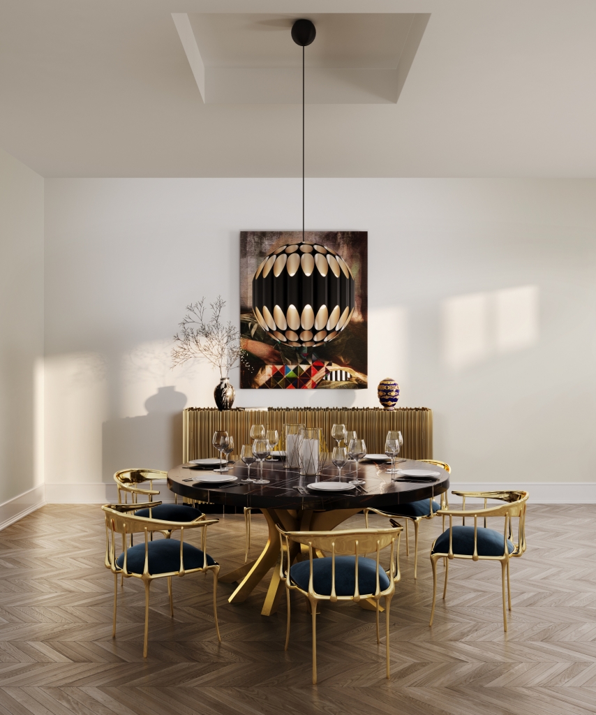 50 luxury dining tables - luxurious dining room, with a round wooden dining table with golden details, chairs with a golden metal frame and a dark blue fabric seat, a round lamp and a golden sideboard in the background and a painting on the wall