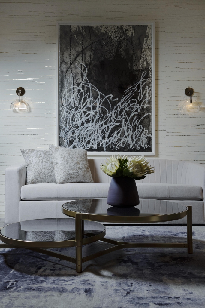 50 luxury center tables - living room with nude sofa and a round gold metal center table