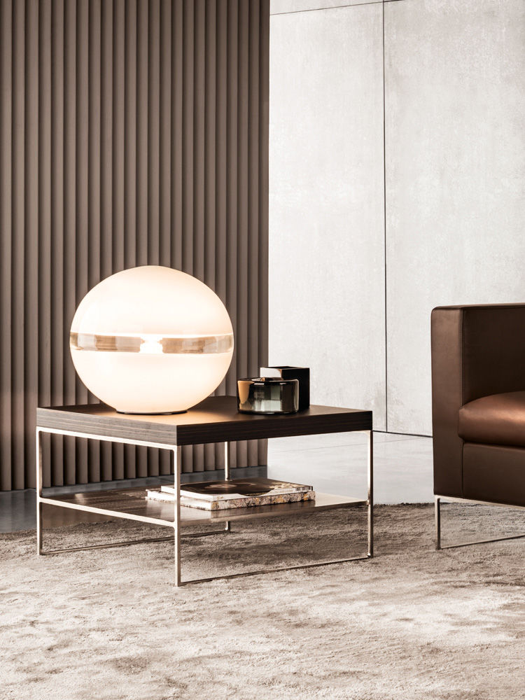 50 luxury center tables - square center table with metal base and wooded top, a round lamp on top of the table and on the side a brown sofa