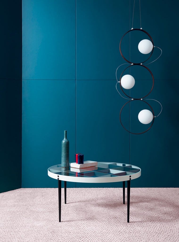 50 luxury center tables - a round center table with some square details on the top and a suspension lamo with round details and white bulbs