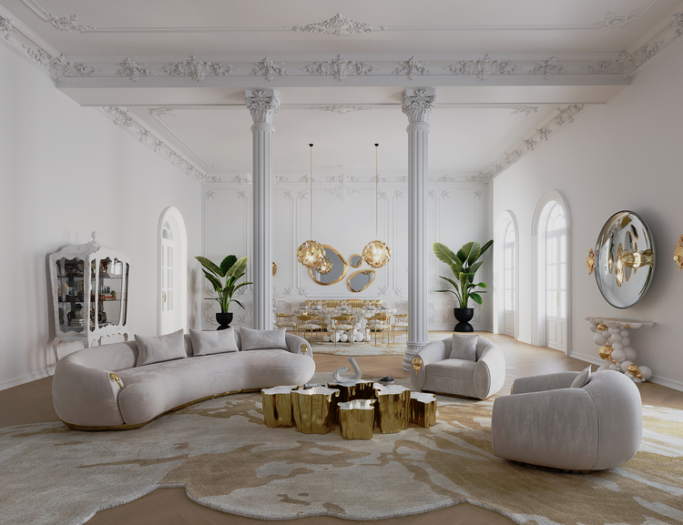 50 luxury center tables - living room with nude curved bege, two nude amchairs all with gold detail in the arms, in the middle a series of center tables in gold with different heights