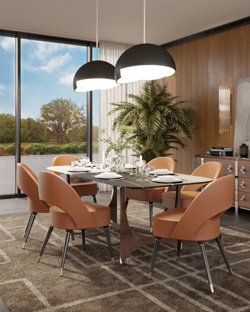50 luxury dining rooms - luxury dining room with dining table in dark wood and legs in lighter wood, chairs in orange leather and dark legs with gold detailing on the end