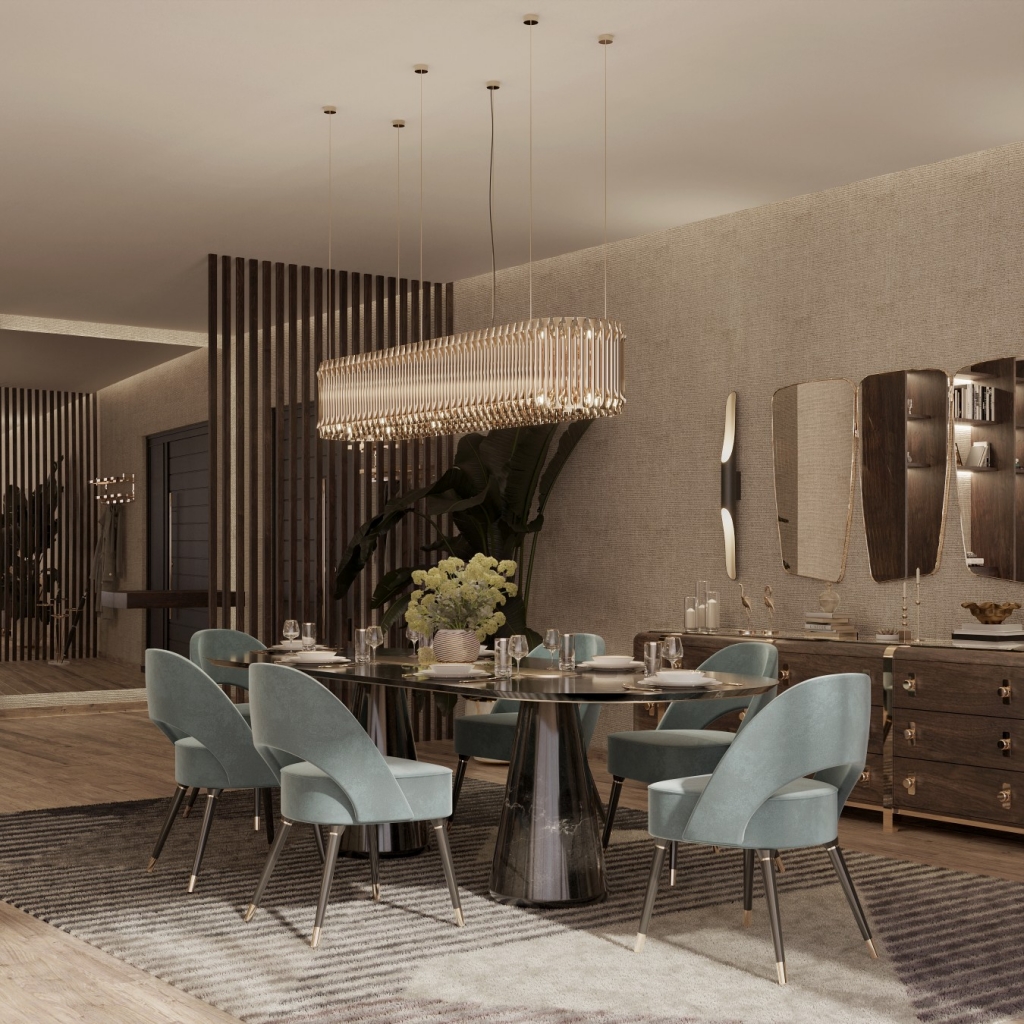 50 luxury dining rooms - luxury dining room with black dining table with blue velvet chairs, the legs are black and have gold detailing at the end, above the table a long crystal suspension lamp with gold detailing  and behind a wooden sideboard and three wall mirrors