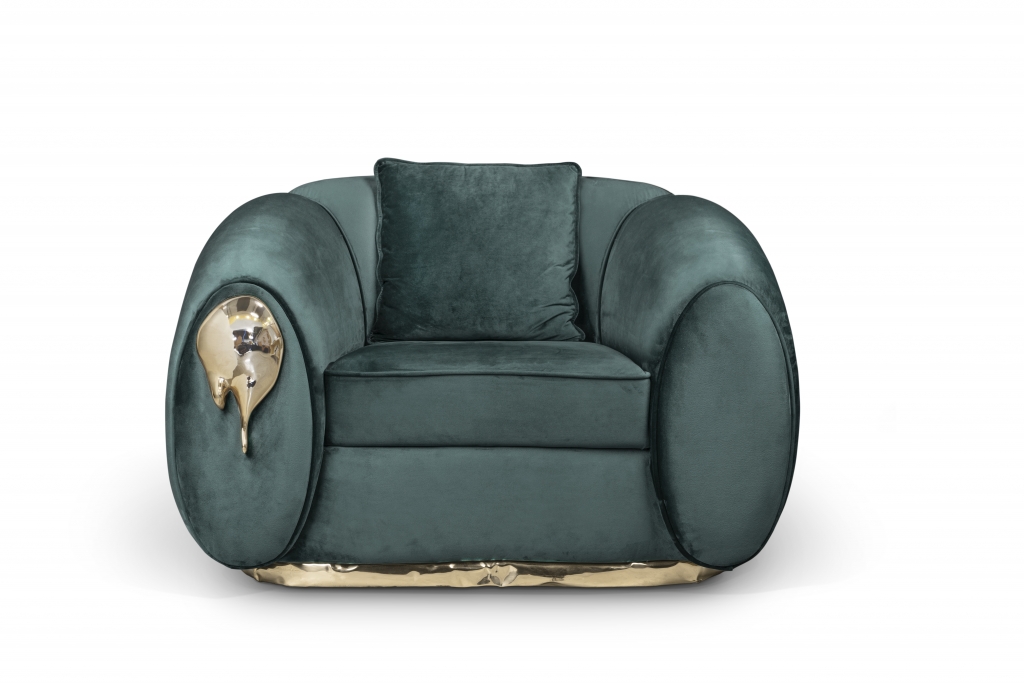 luxury home in L.A- green velvet armchair with gold details