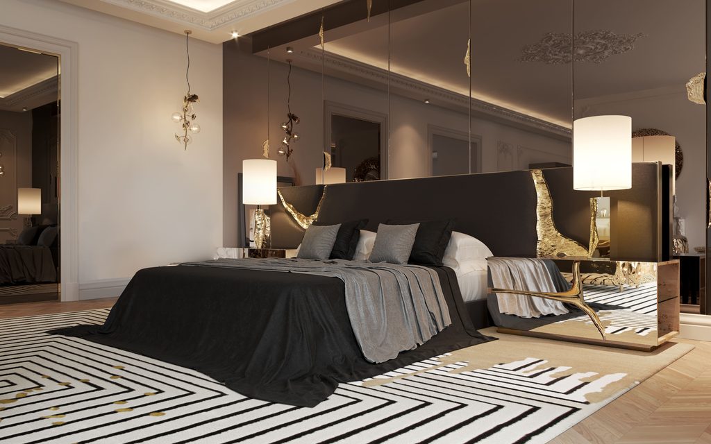 Luxury bedroom interior styled with a dark upholstered headboard, statement gold cracks design, and sleek nightstands
