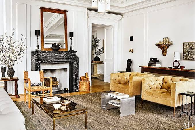 Elegant living room with black marble fireplace, interior designers