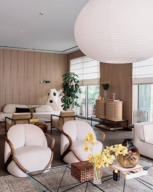 Minimalist living room with paper pendant, luxury interior designers in India