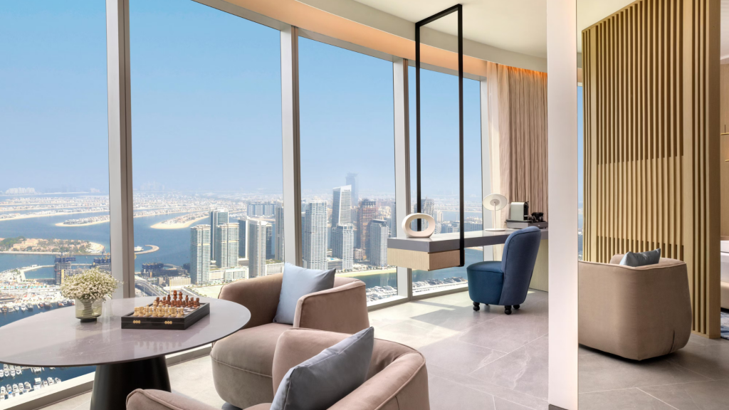 Luxury suite at Ciel Dubai Marina with floor-to-ceiling windows and contemporary design.