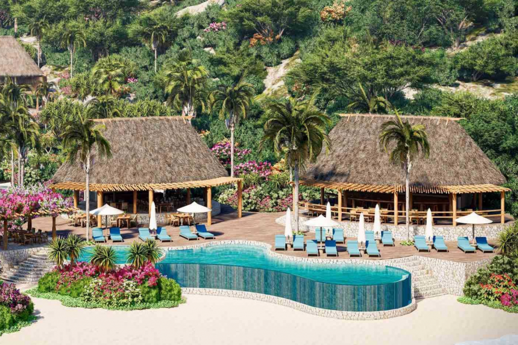 Luxury Hotels Opening in 2026, Tropical beach club with thatched-roof cabanas, an infinity pool, and lush bougainvillea flowers by the ocean.