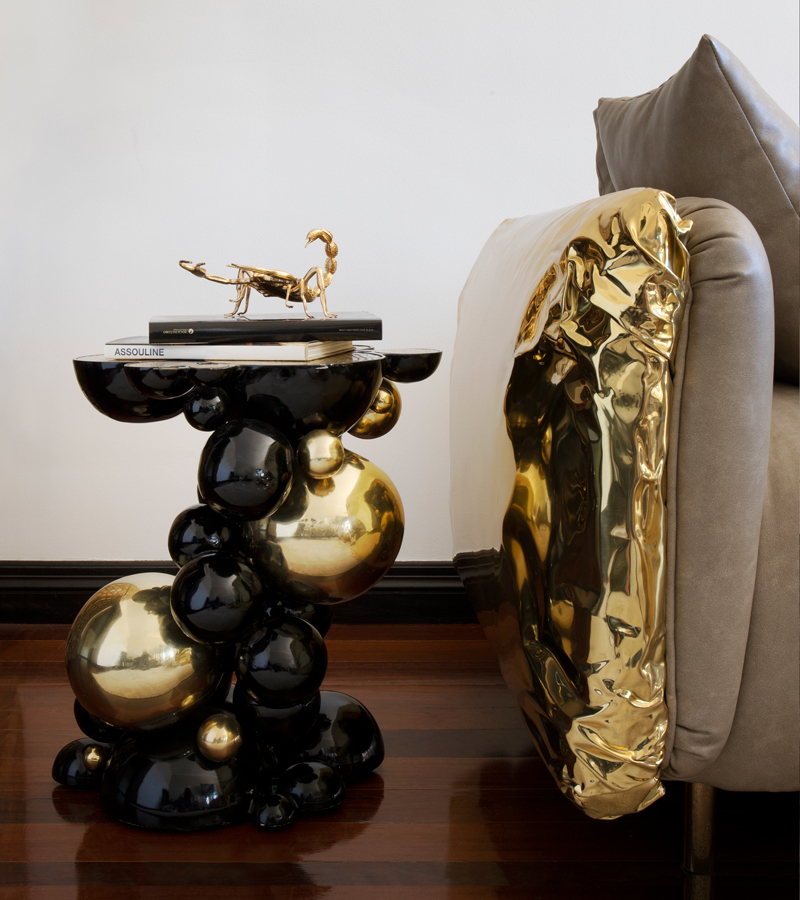 Compact Newton Side Table from the Newton Family by Boca do Lobo, combining artistic metallic spheres with functional contemporary design.