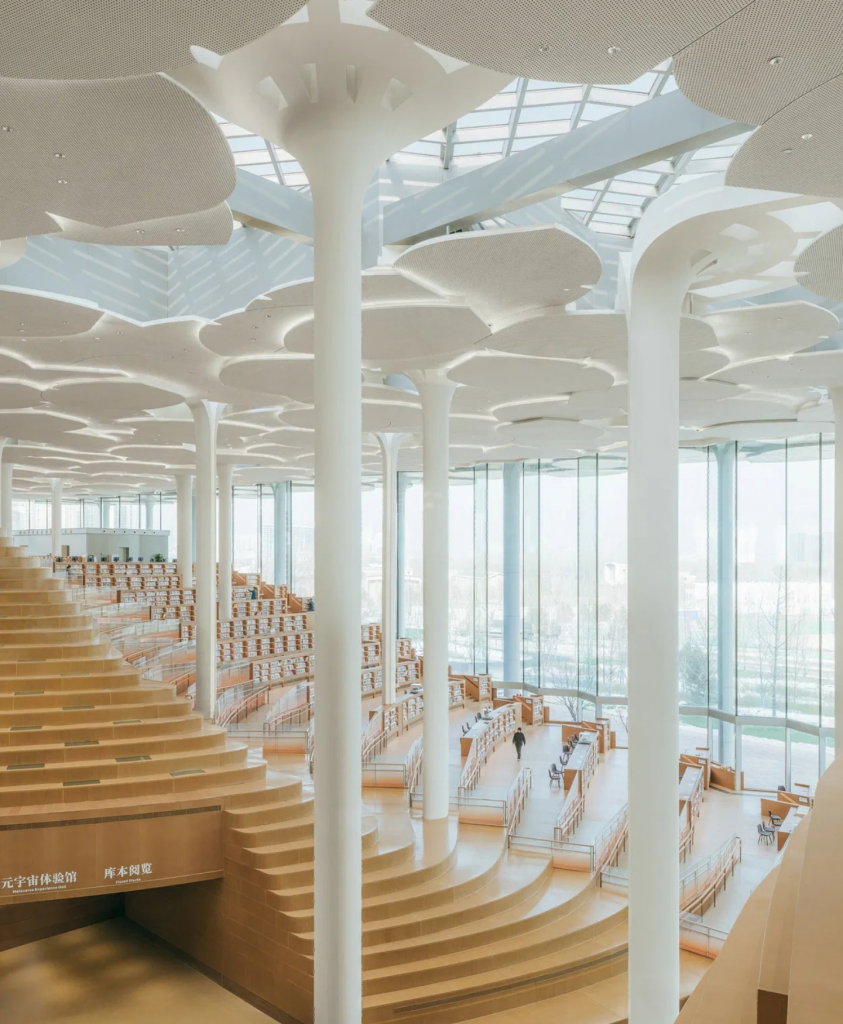 Beijing Library designed by Snøhetta featuring flowing interior architecture and luminous reading spaces in Beijing