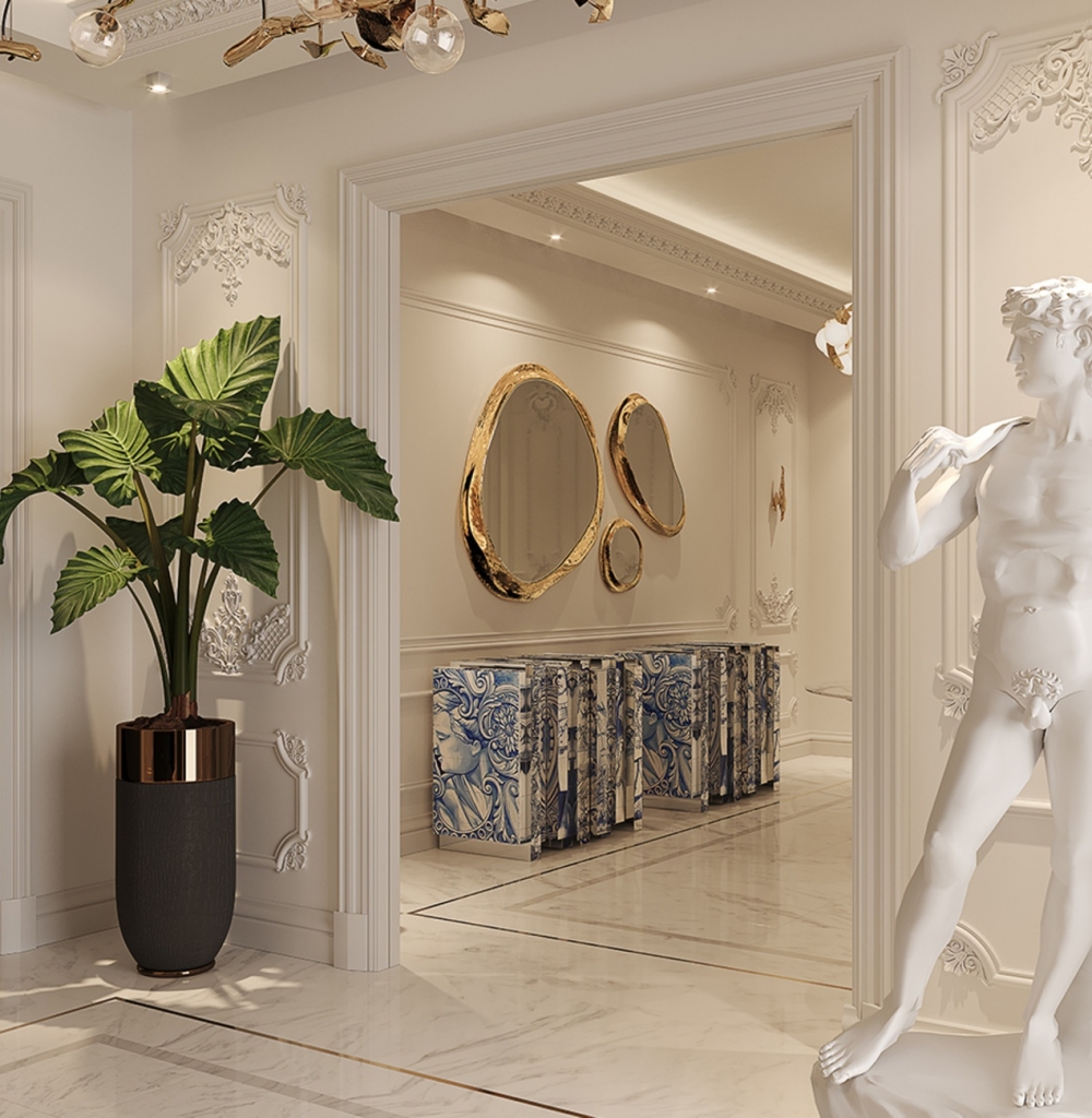 luxury entryway designs featuring Heritage Sideboard by Boca do Lobo in a marble hallway with gold mirrors