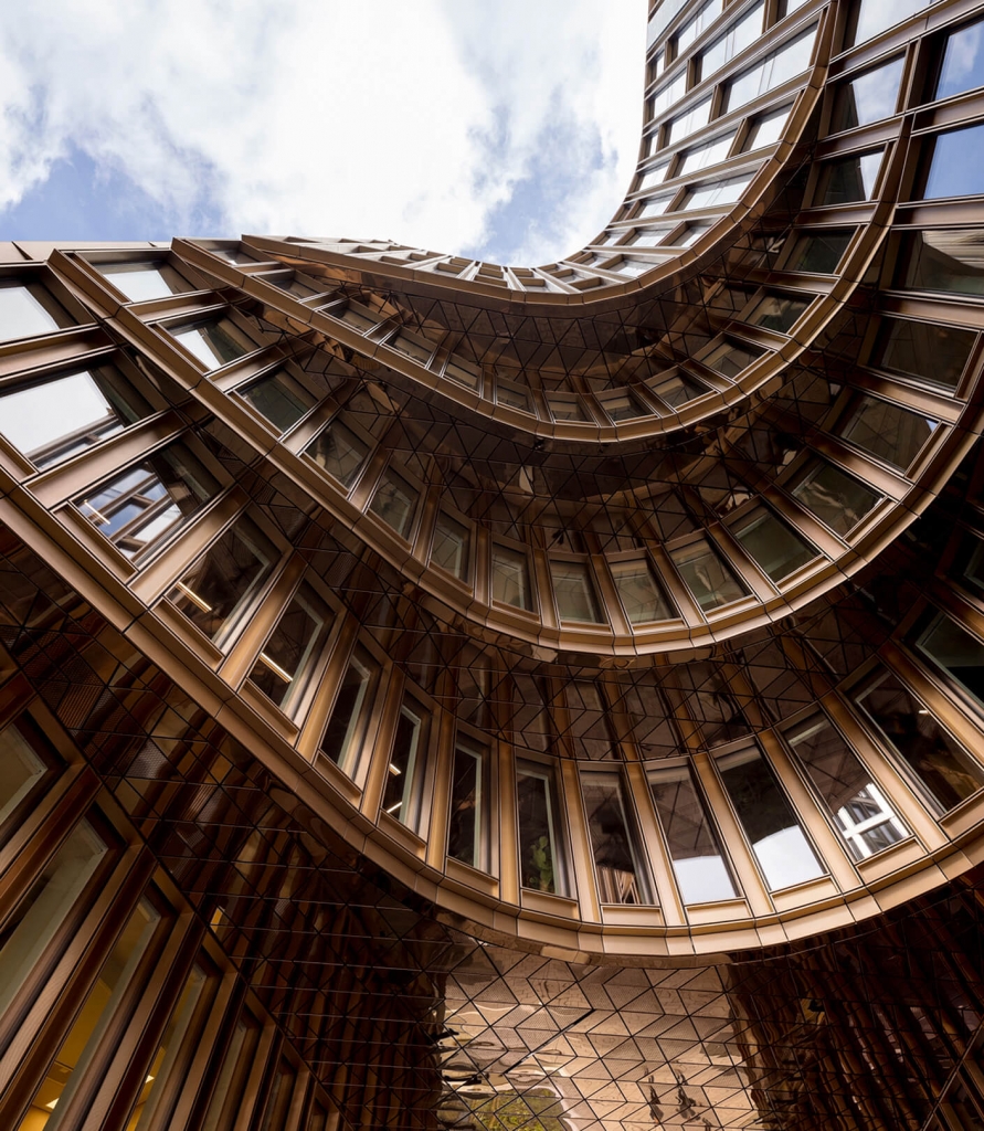 Modern architectural project by Perkins&Will featuring sustainable design, open spaces, and innovative materials in a contemporary building