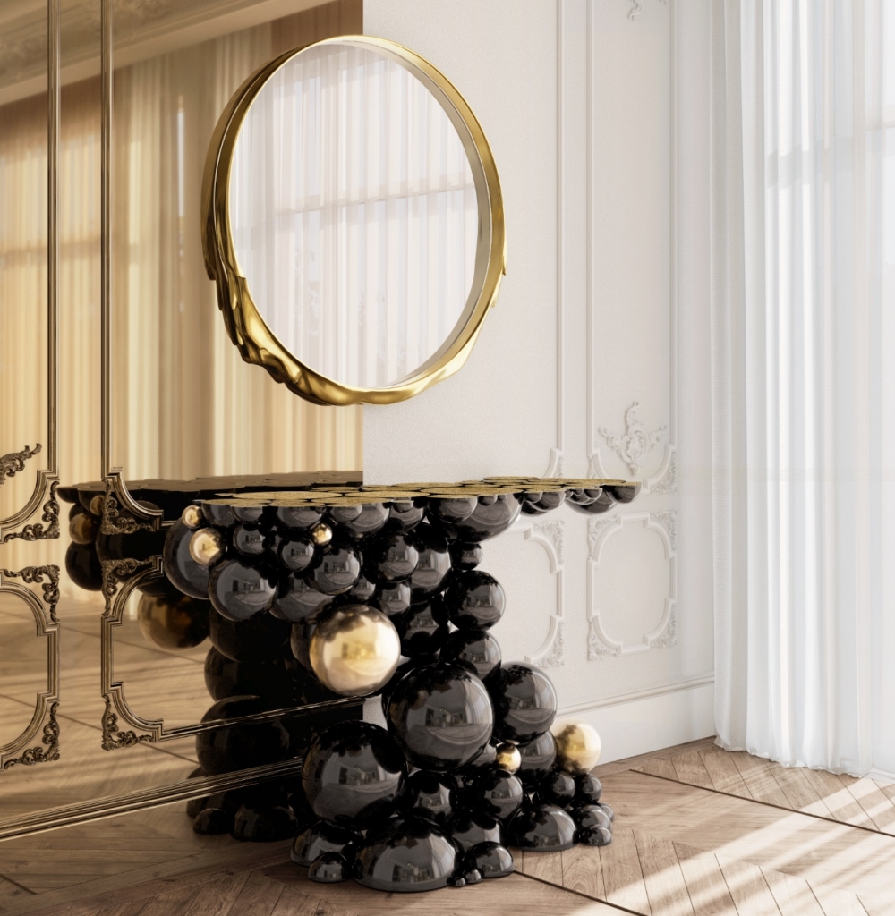 luxury entryway designs with Newton console by Boca do Lobo featuring sculptural gold and black spheres