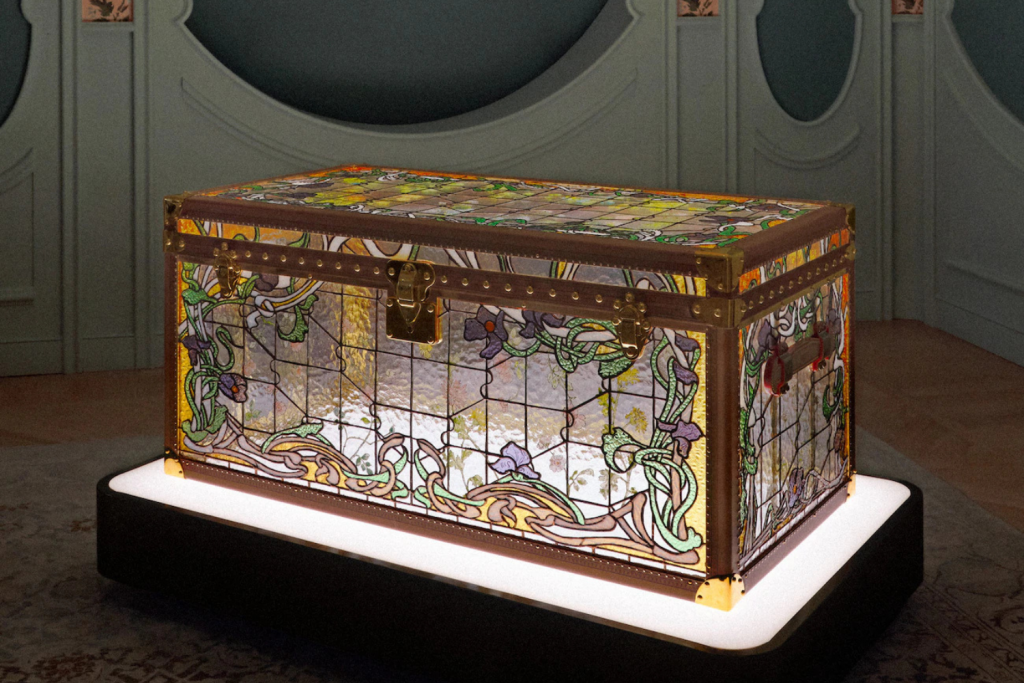 Classic LV trunk redesigned with intricate Art Nouveau stained-glass panels. Objets Nomades