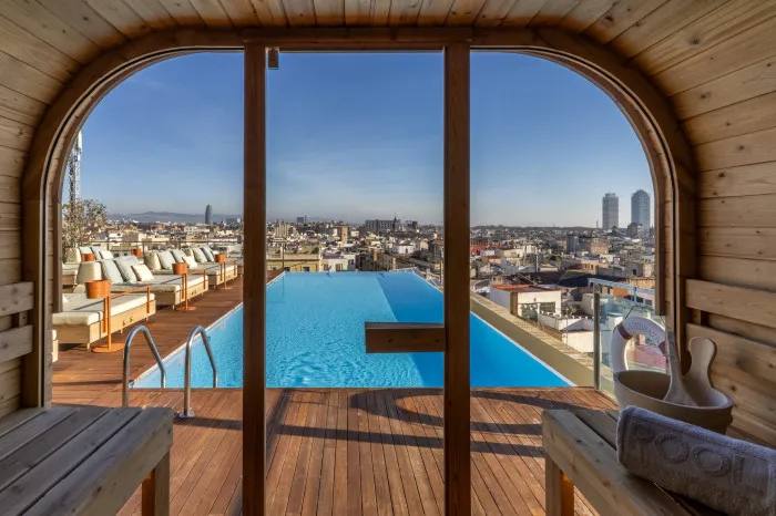 rooftop of an hotel with a pool